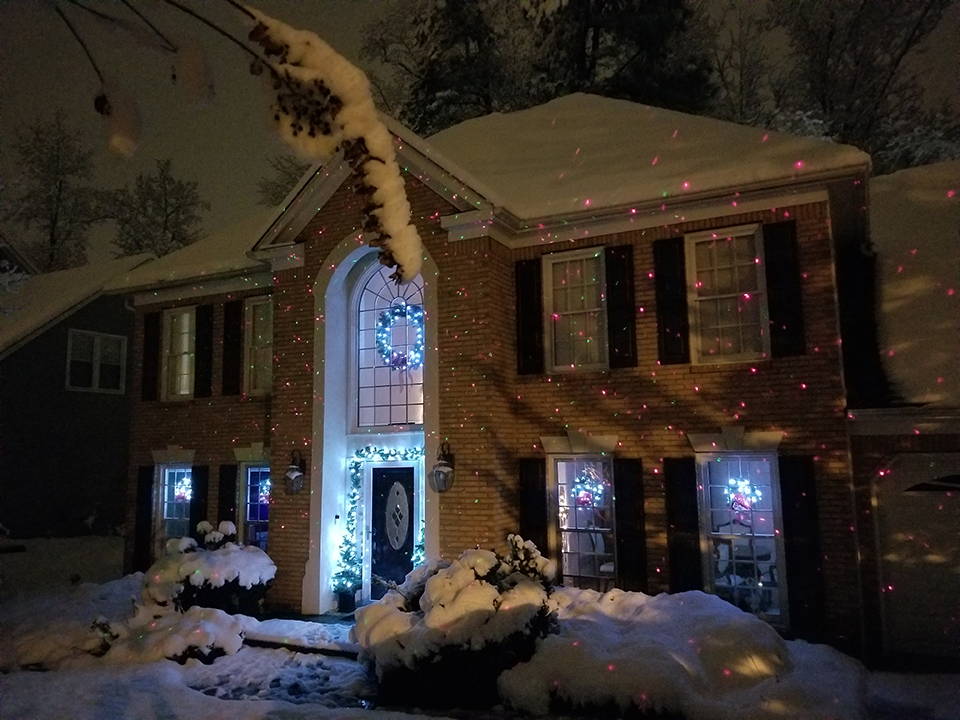 John_H's house from the street at night with Christmas decorations and snow!